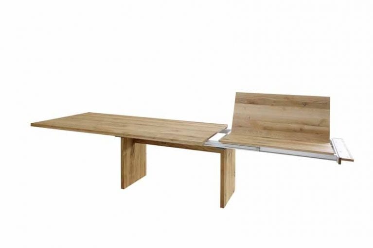Freitsteller von dem ausgezogenen Esstisch Contur 3100 mit einer Klappeneinlage